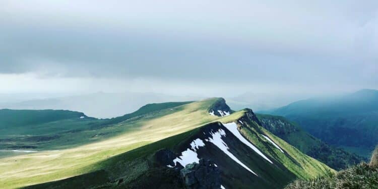 mountainunder cloudy sky during daytime